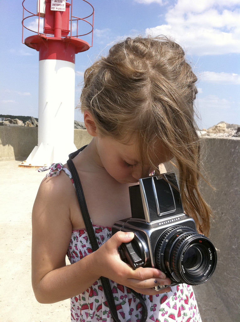 Grace getting to grips with the Hasselblad 500cm. Picture taken with an Apple telephone