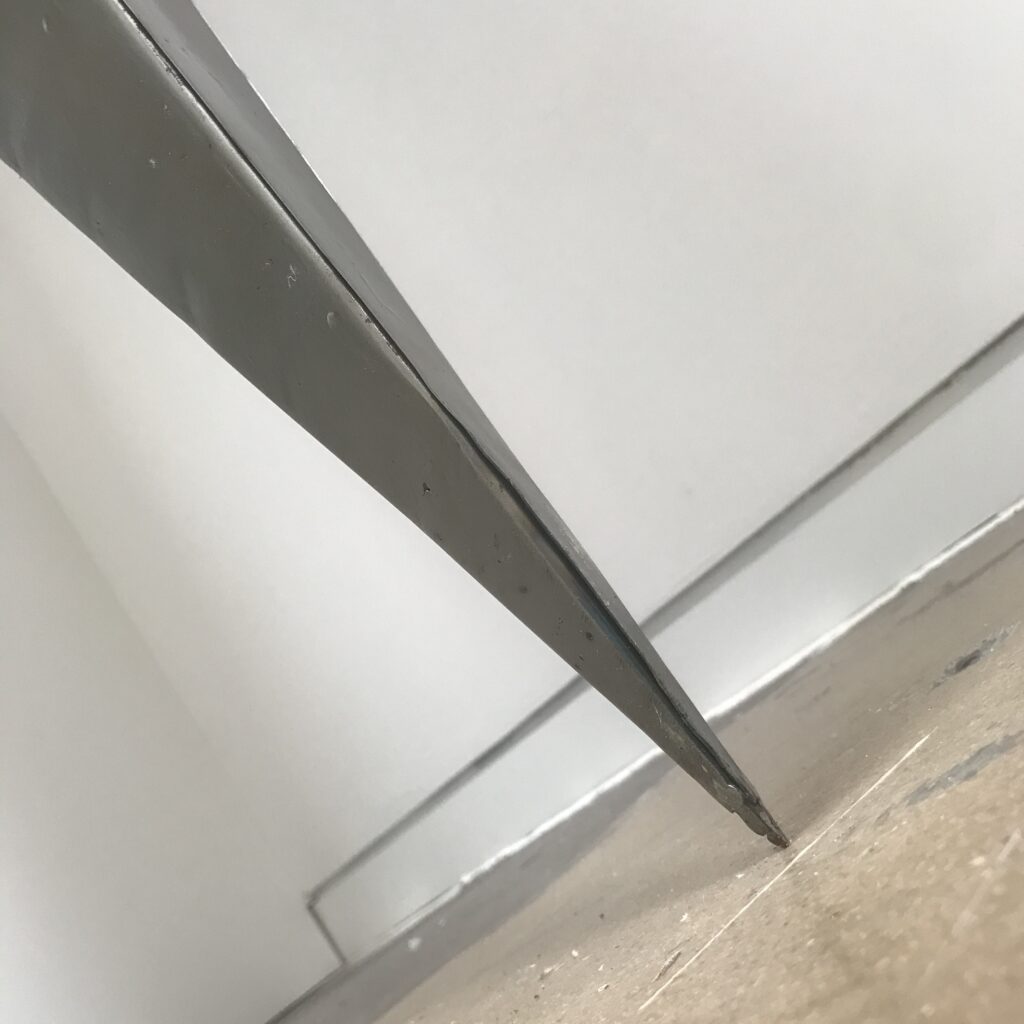 Close up of point of metal spike